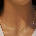Gentle drop-shaped artificial zircon pendant on a 925 silver O-chain necklace in rose gold finish.