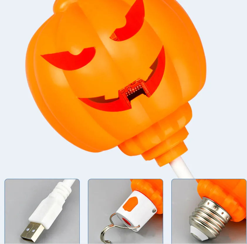 USB rechargeable plastic pumpkin lamp with purple or yellow LED lighting measuring 8.3cm diameter
