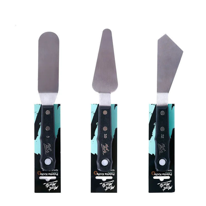Set of three stainless steel artist palette knives numbered 3, 10, and 12 on a surface.