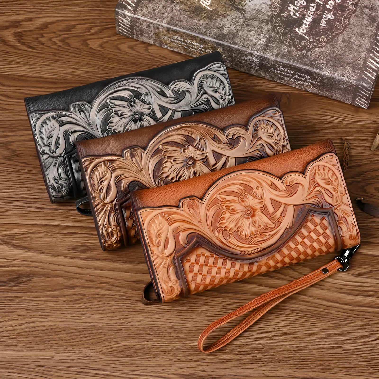 Brown tri-fold leather wallet with deep embossed floral pattern, shown open to reveal card slots and lining.