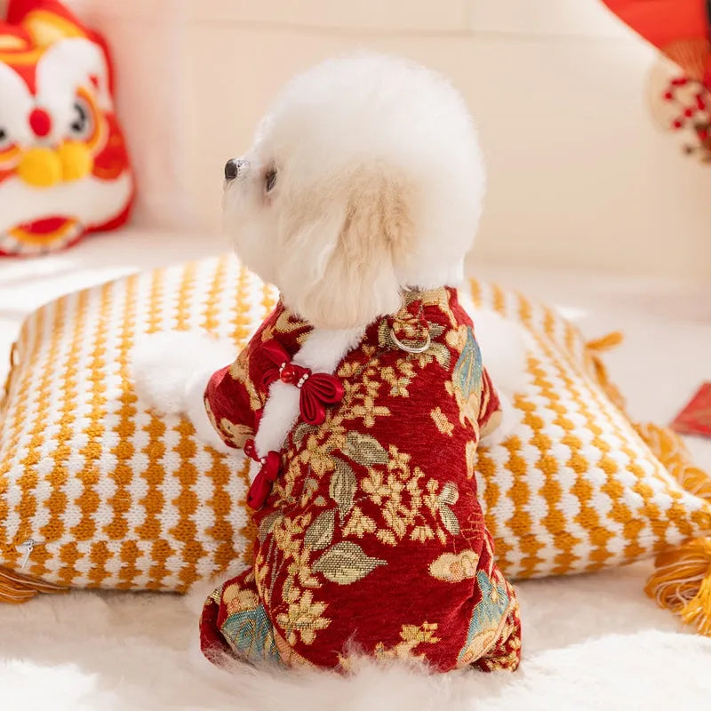 Red brocade pet jumpsuit with faux fur trim and Chinese knot buttons for Lunar New Year