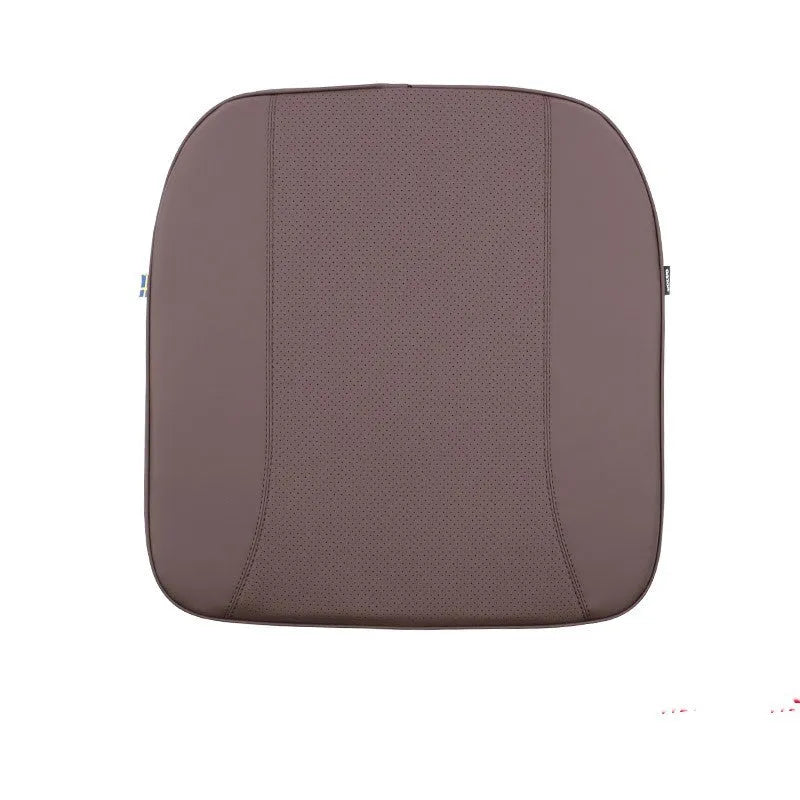 Volvo car headrest, neck pillow, and lumbar support cushion set in a minimalist design on a car seat