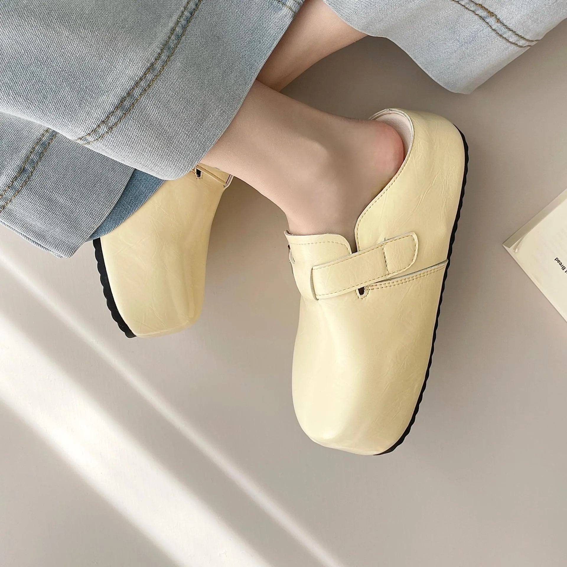 Flat buckle casual sneakers with round toe in yellow, creamy-white, silver, and black colour options
