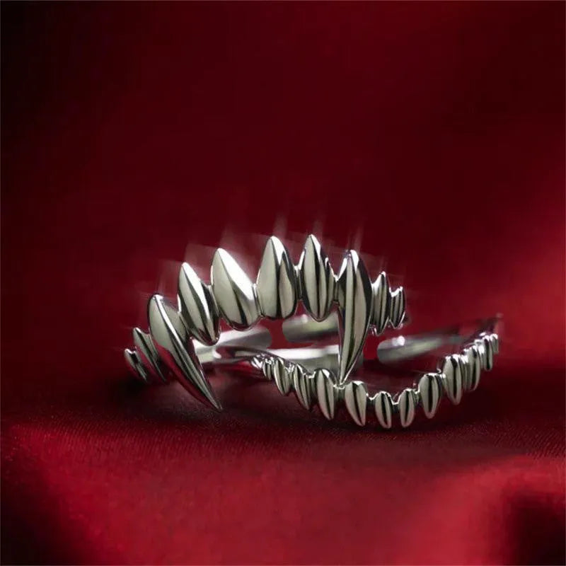 Silver vampire split open ring on finger showing adjustable opening and zinc alloy construction
