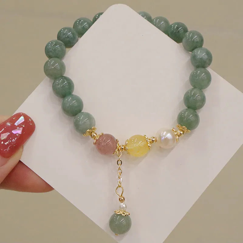 Geometric jade and pearl bracelet ornament in Han style with three-dimensional decoration.