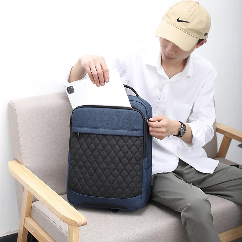 Men's Oxford cloth travel backpack in solid colour with curved shoulder straps and diamond mesh detailing