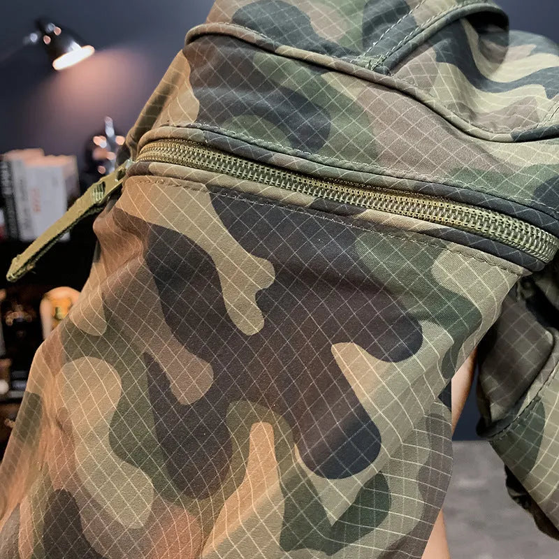Men's camouflage cargo shorts in a loose fit with cargo pockets, shown in khaki colour.