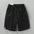 Men's loose straight linen shorts in green or black with drooping casual style