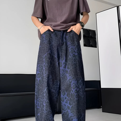 Blue cotton leopard print wide-leg pants with zip fly, full-length view