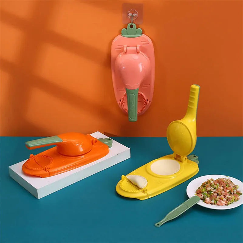 Orange and white plastic manual dumpling maker tool with press and mould.