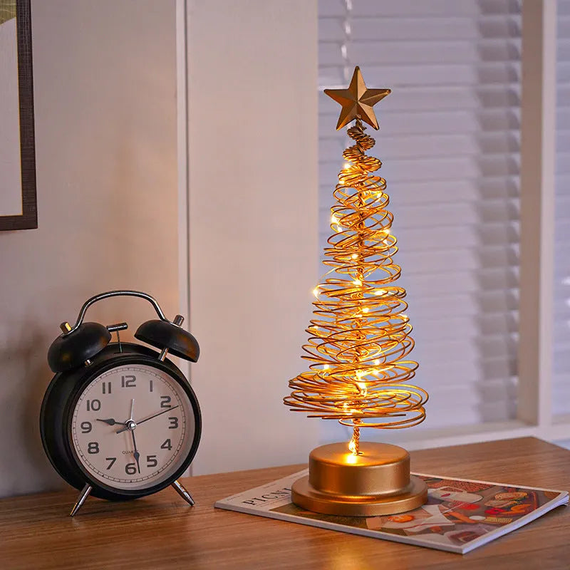33cm tall wrought iron LED Christmas tree spiral light with warm white lights on tabletop