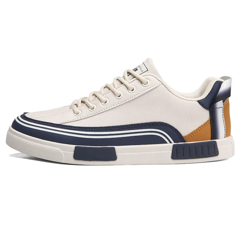 Men's beige, white and green canvas casual shoes with mesh panels and flat heel.