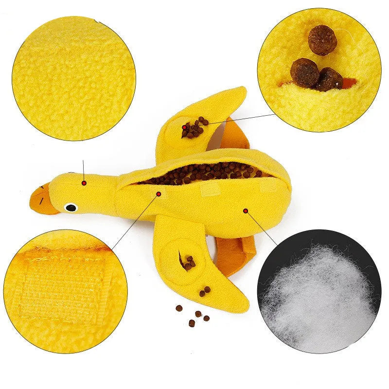 Yellow duck plush dog toy with squeaker and treat dispensing features