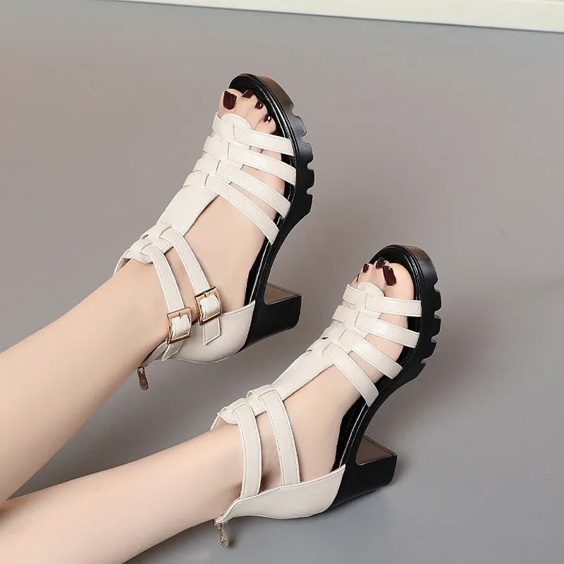 Women's hollow-out high heels with rhinestone decoration in beige and black colours with buckle fastening