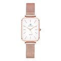 Rose gold women's quartz watch with woven steel strap on wrist, showing alloy case.