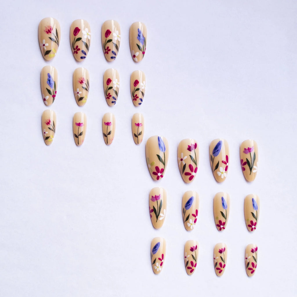 Removable flower pattern nail art set for almond-shaped nails in a rose and tulip design.