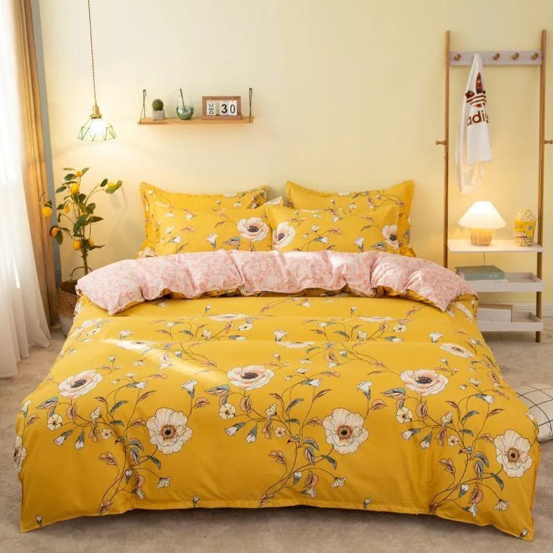 Cotton duvet cover and fitted sheet bedding set in a colour option, shown on a bed