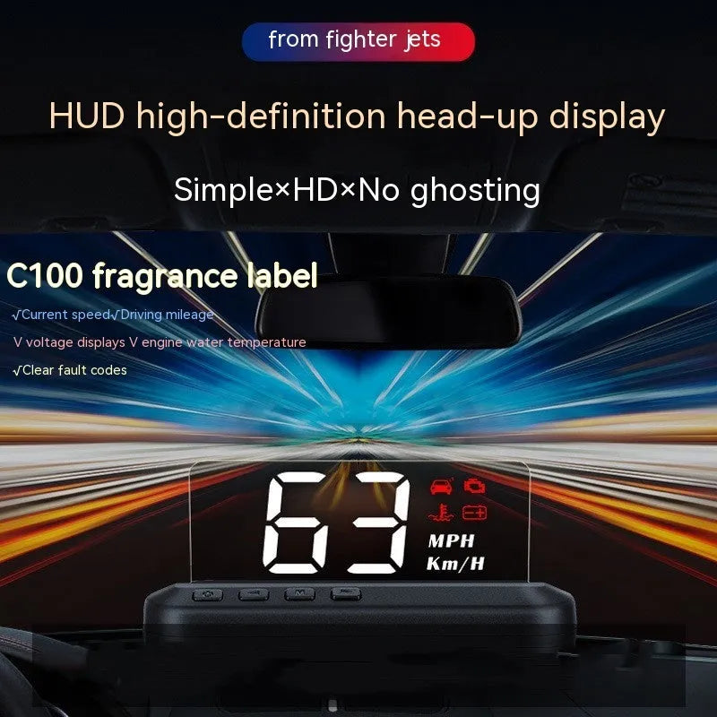 Black car head-up display unit on a dashboard, showing a projected speed readout on the windscreen.