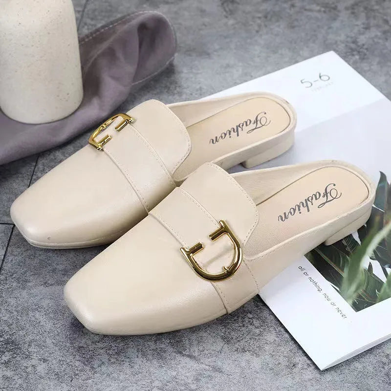 Women's PVC closed toe half slippers with buckle fastening in white, black and brown colours