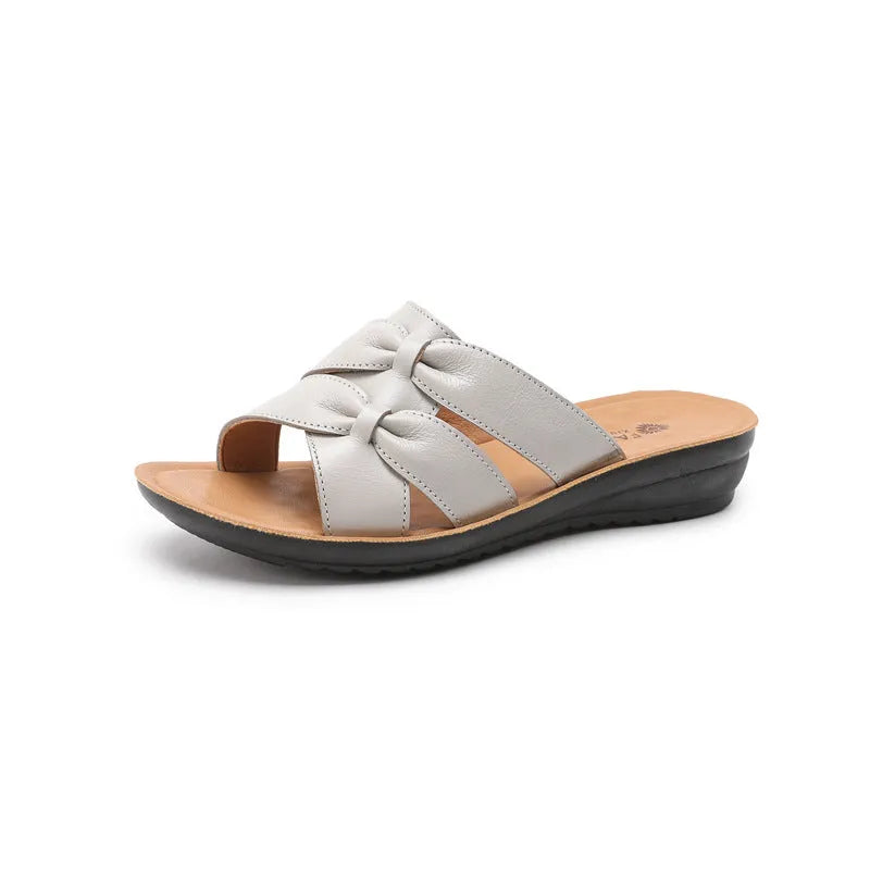 Women's cowhide slippers with soft bottom in red, black and beige colours