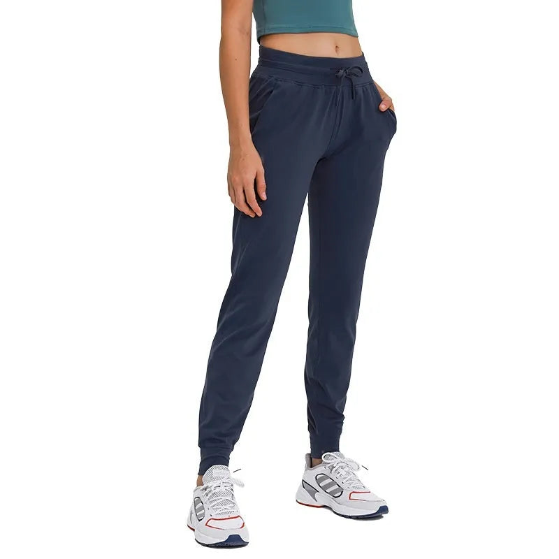 Women's high waist yoga pants with a drawstring waistband in distilled coffee colour.