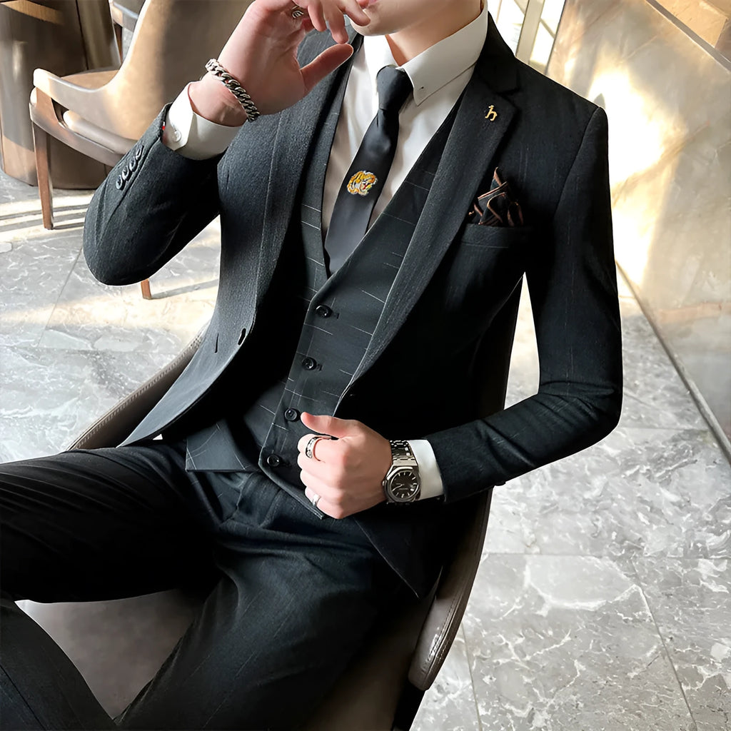 Slim fit men's business suit in British style available in black and dark grey colours