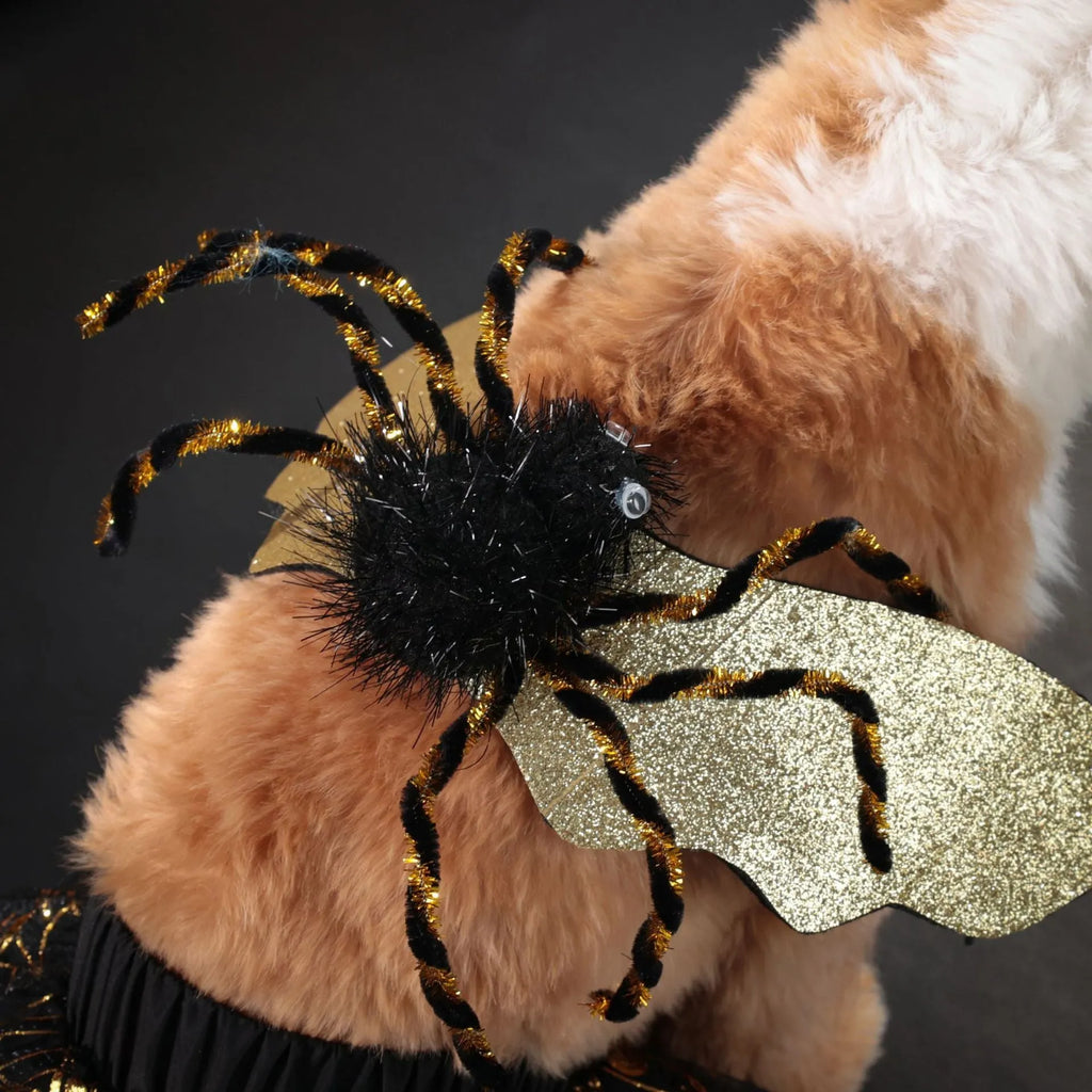 A dog wearing a smart suit-style Halloween costume in a classic suit colour.