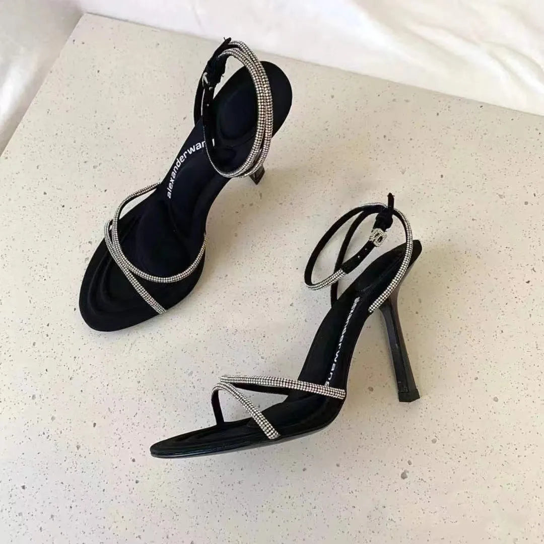 Women's rhinestone cross strap stiletto high heels in black with pointed toe and 9cm heel