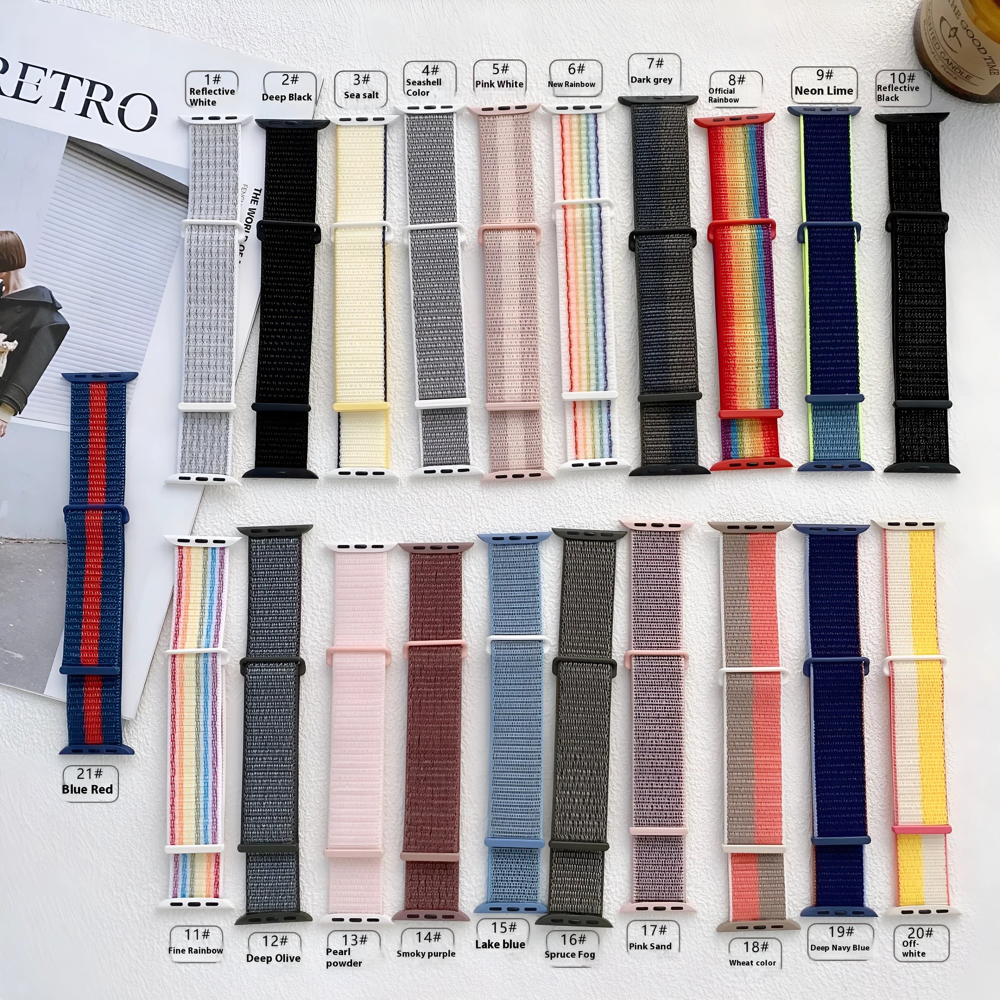Woven nylon Apple Watch strap in multiple colours including reflective and rainbow patterns.
