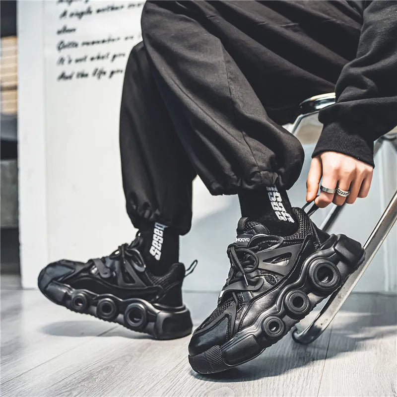 Men's black mesh sneakers with thick rubber sole and lace-up design for height increase