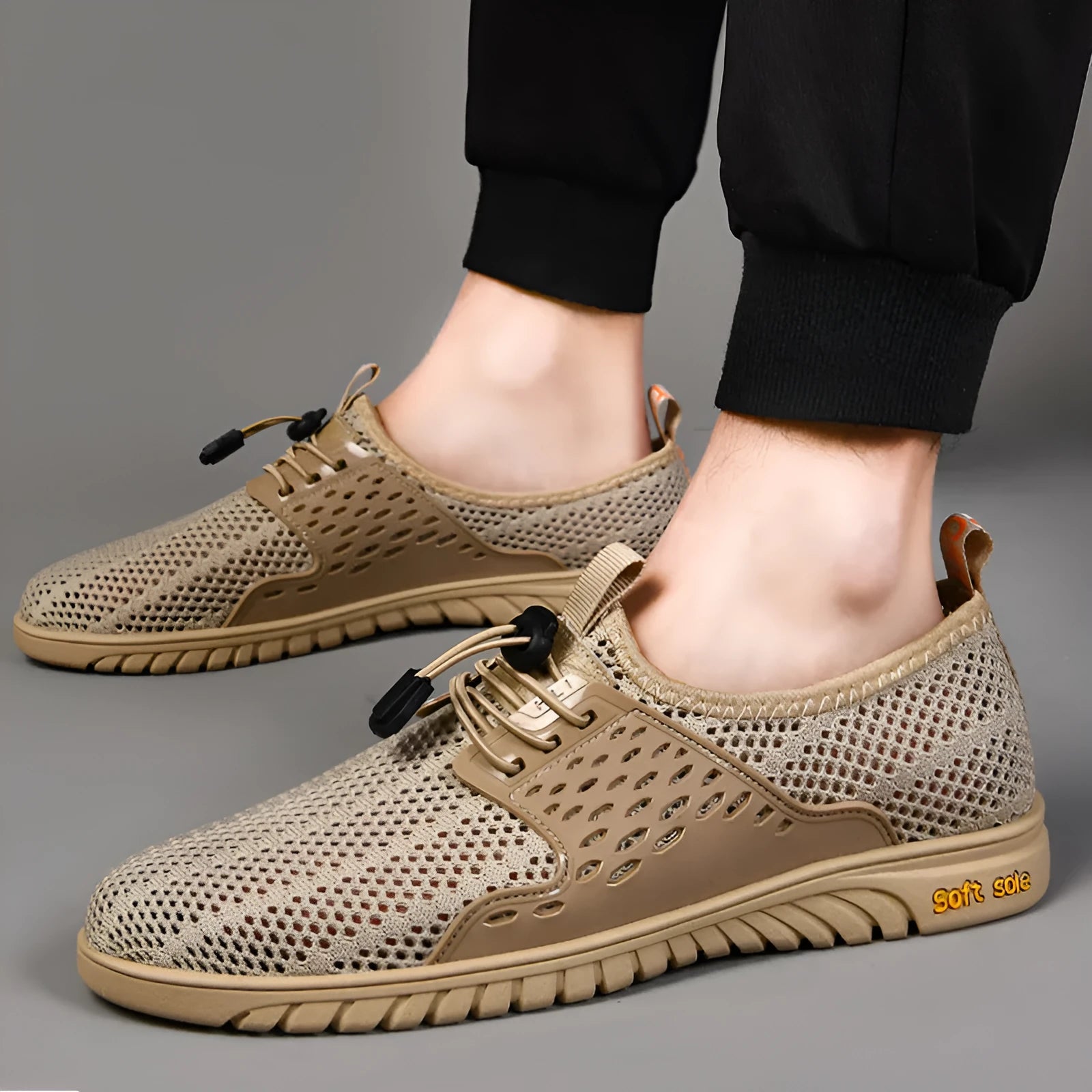 Men's black casual summer shoes with mesh uppers and elastic band closure