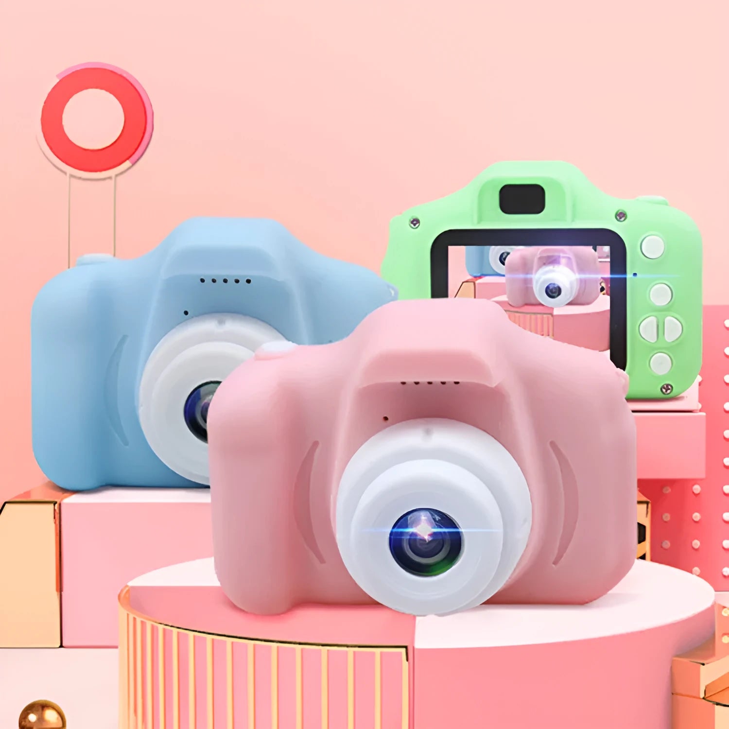 X2 HD mini cartoon kids digital camera in silicone body with 2-inch screen and strap.