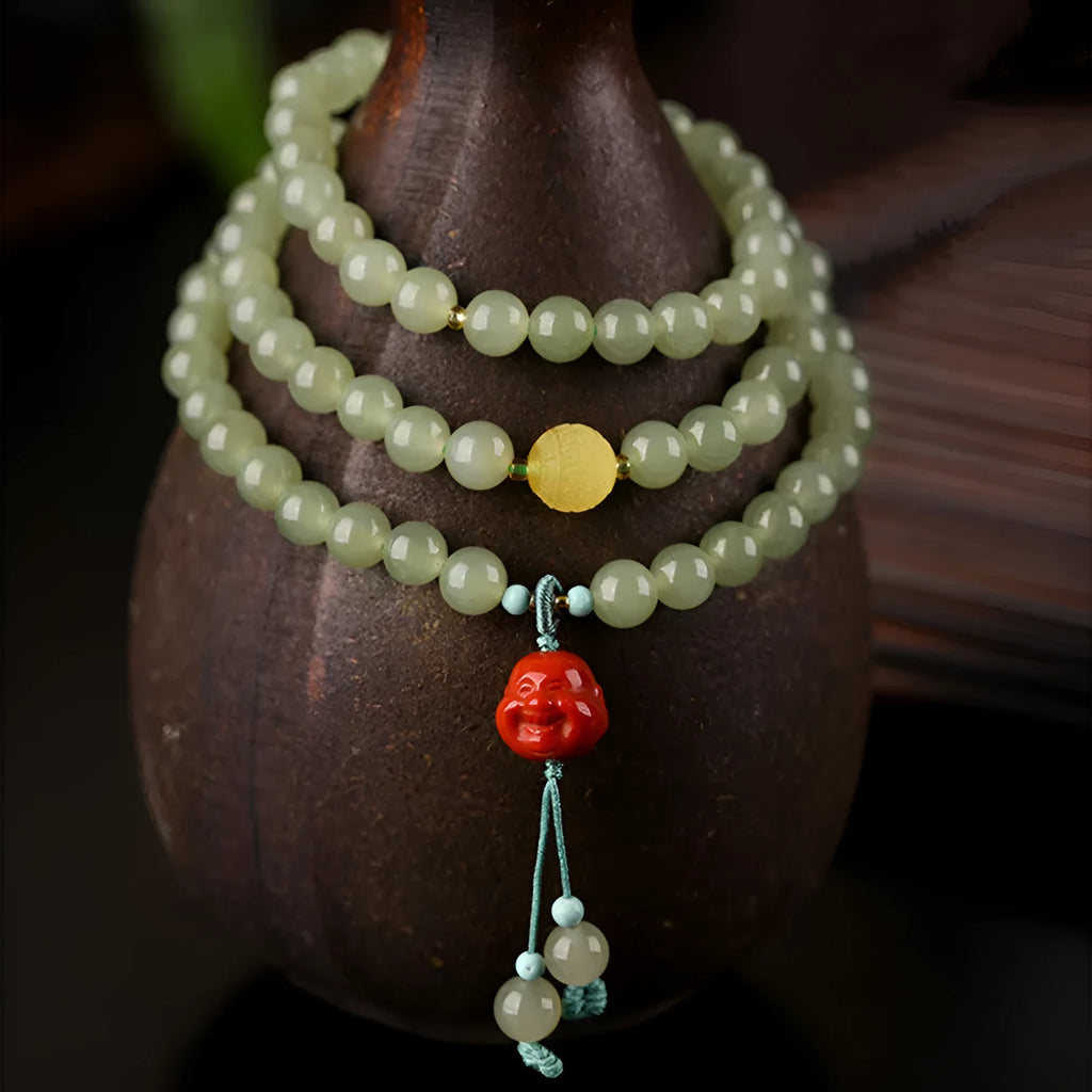 Pale blue Hetian jade bracelet with 6mm beads in three-circle design on wrist