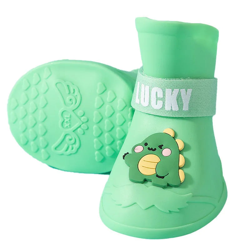 Pack of four silicone waterproof dog booties with non-slip sole in multiple colours on white background