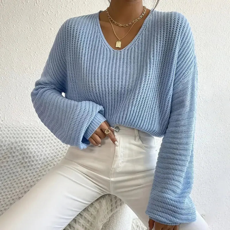 Women's solid colour long sleeve casual pullover in a loose fit, shown in various colours.