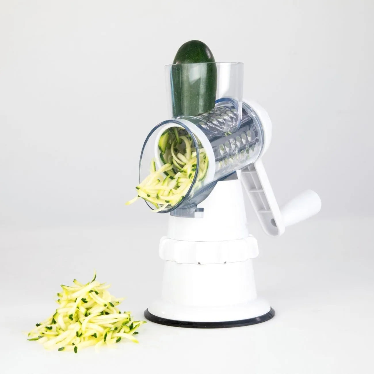 3 In 1 manual vegetable slicer in white BPA-free plastic with stainless steel blades and suction feet
