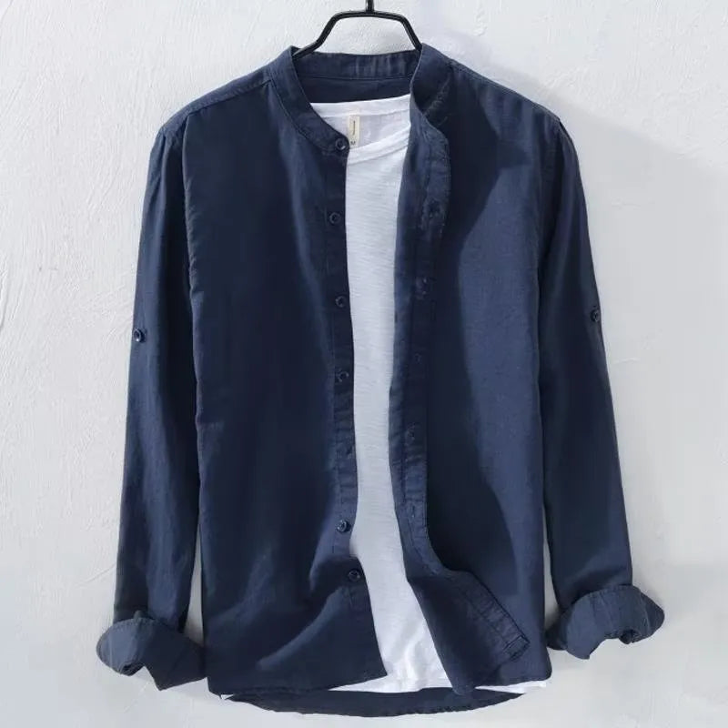 Man wearing a loose fit light blue linen cotton long sleeve casual shirt