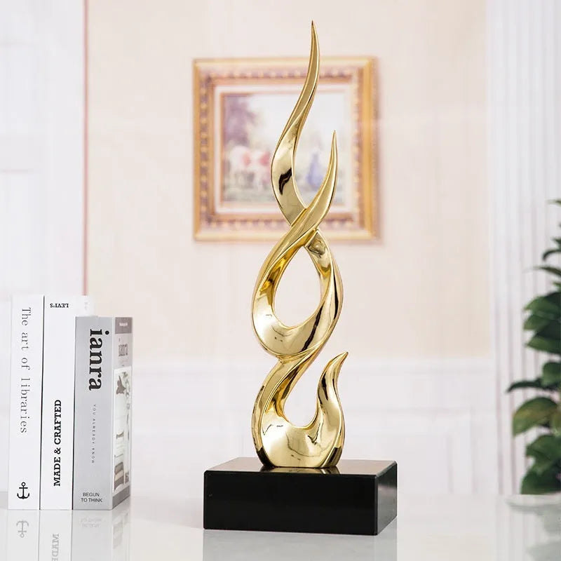 Large modern festival high-rise ornament in resin plastic with metallic gold finish