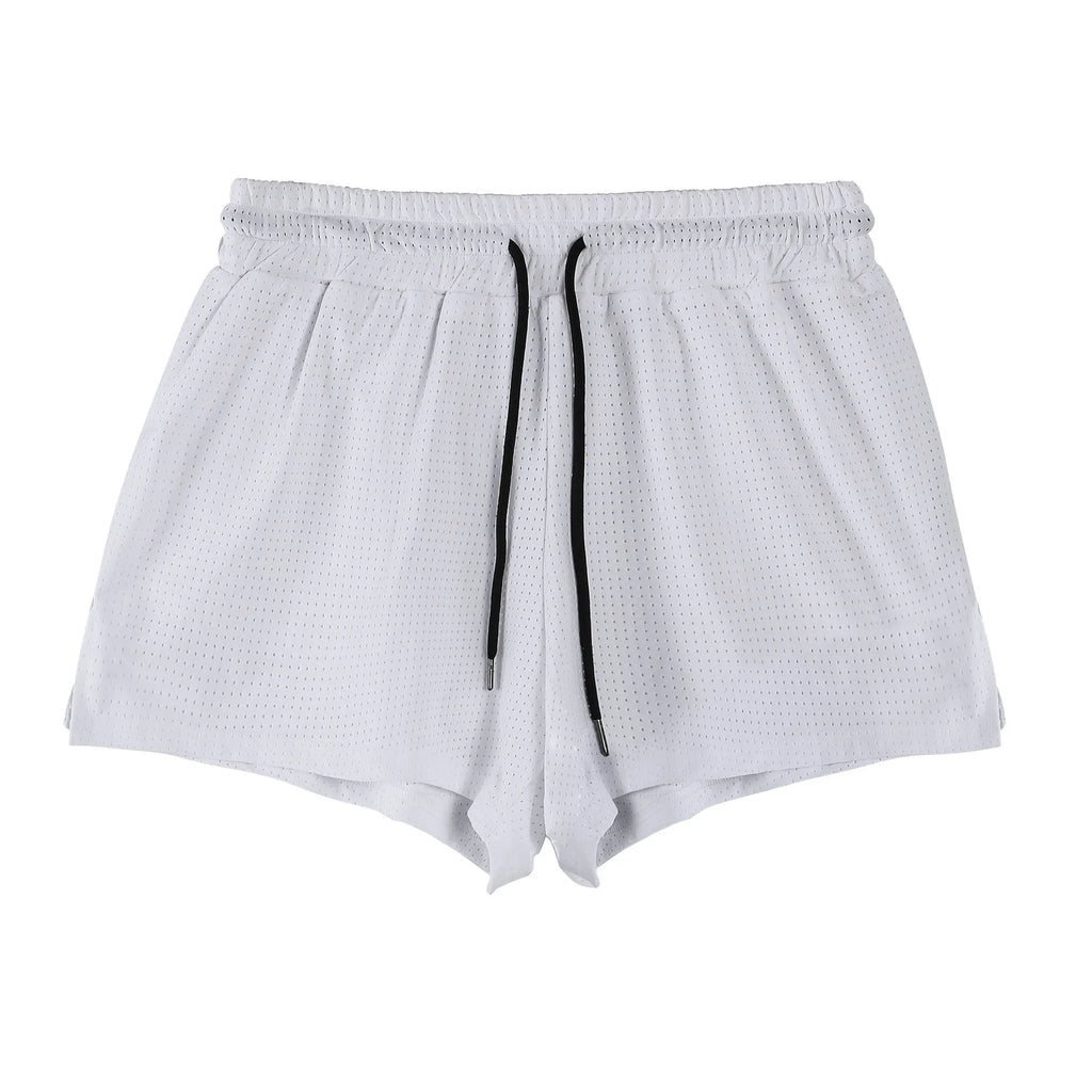 A pair of men's quick-dry nylon shorts in black on a hanger, showing the mid-waist fit and shorts length.