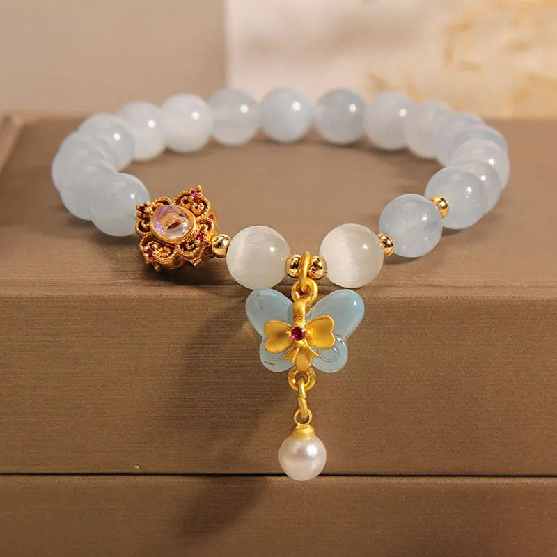 Women's crystal bracelet with butterfly pendant and aquamarine rhinestones