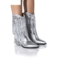 Women's black chunky heel tassel boots with pointed toe and super high stiletto heel on a white background.