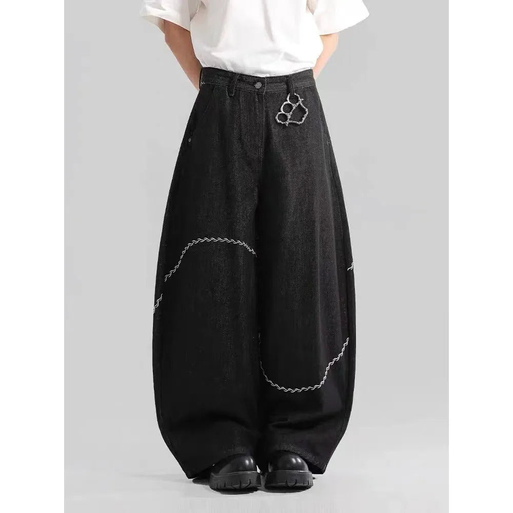 Black men's straight-leg denim trousers with a mid-rise waist and zip fly.