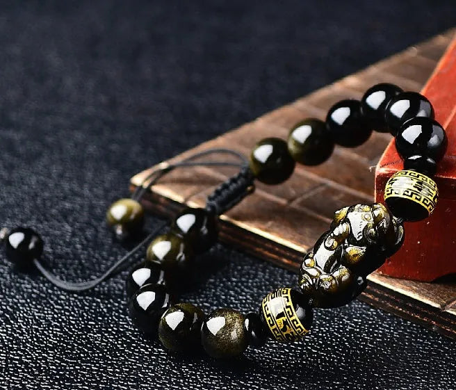 Hand-woven golden obsidian Pi Xiu bracelet with animal zodiac modelling in Chinese style