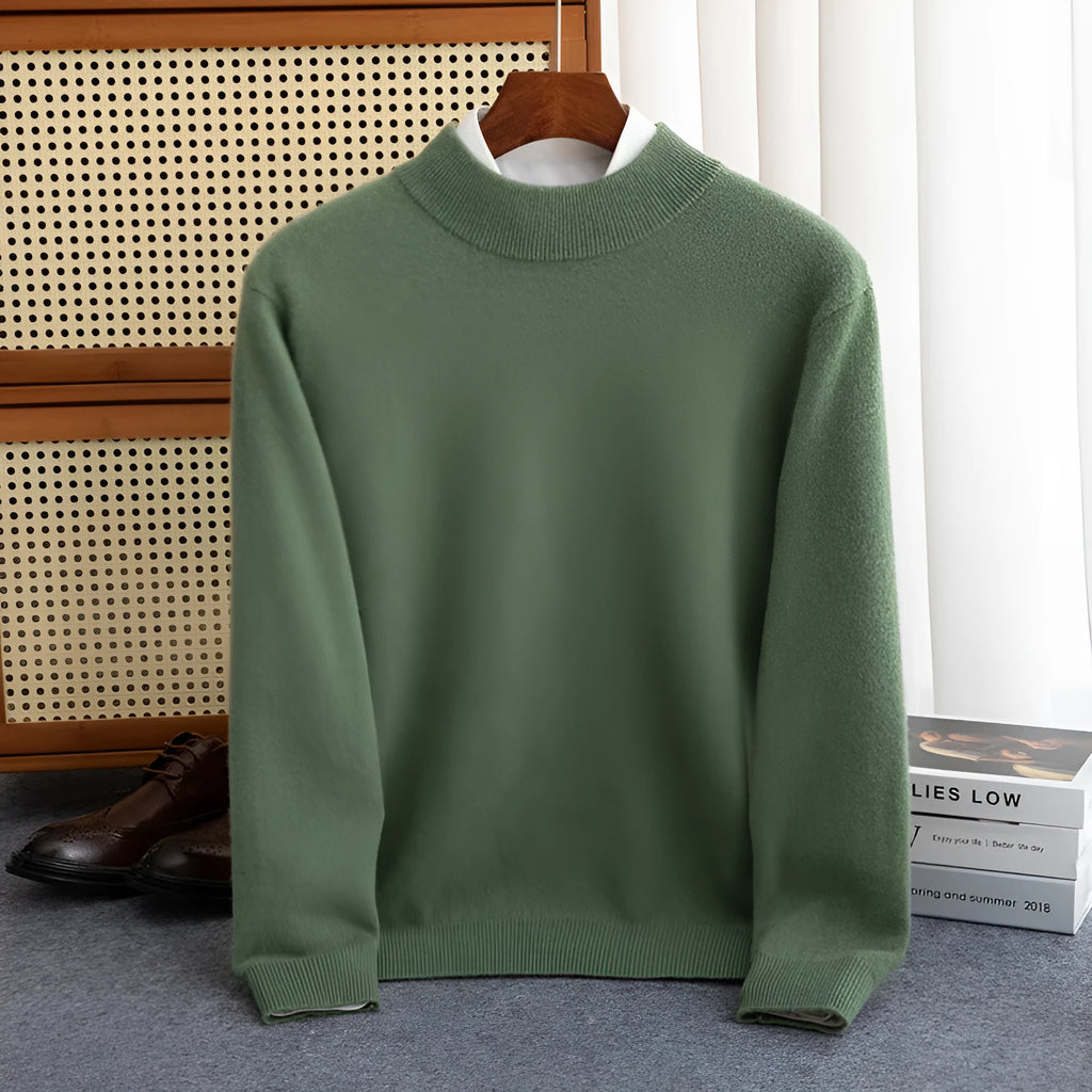 Man wearing a loose-fit half-collar wool sweater in a neutral colour, showing the knitted texture and relaxed fit.