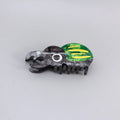 Handmade green cartoon beetle grip made from cellulose acetate sheet holding papers.