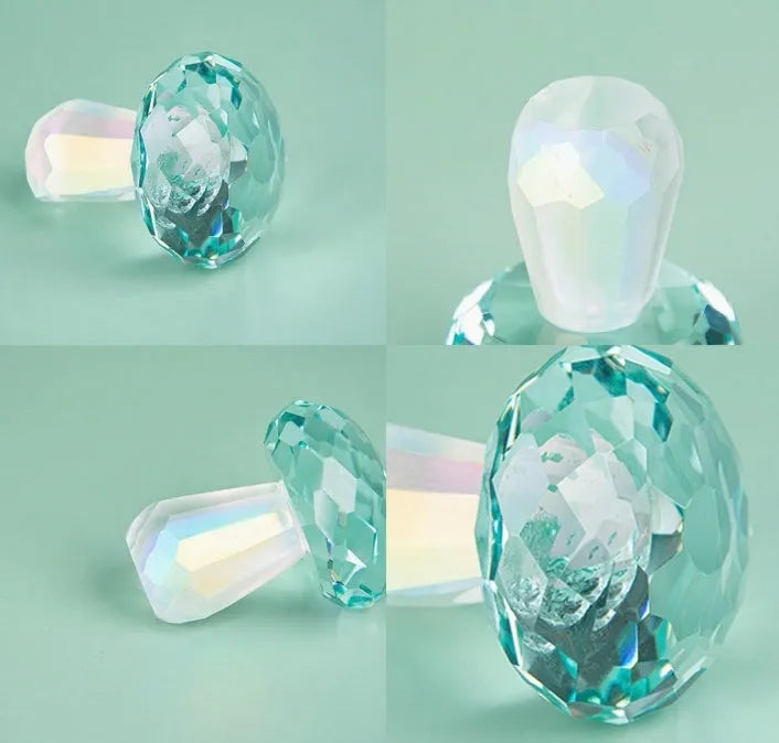 Modern geometric crystal mushroom decoration in transparent, green, red, or yellow, 40 by 53 millimetres.