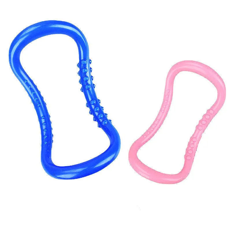 Blue, pink, and purple PP plastic yoga rings for stretching and pilates.