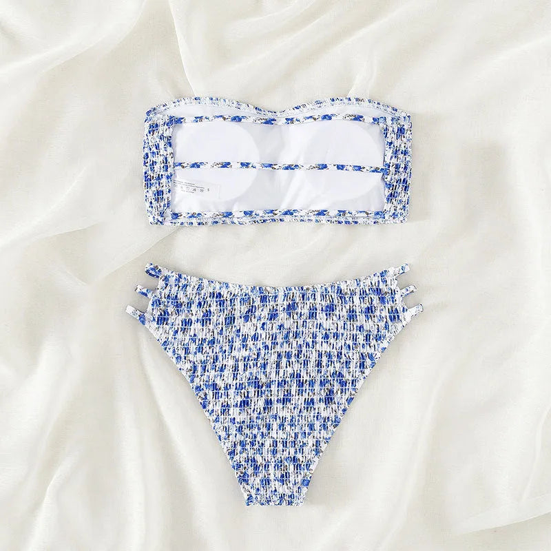 Women's strapless floral swimsuit with high-waist briefs on a mannequin