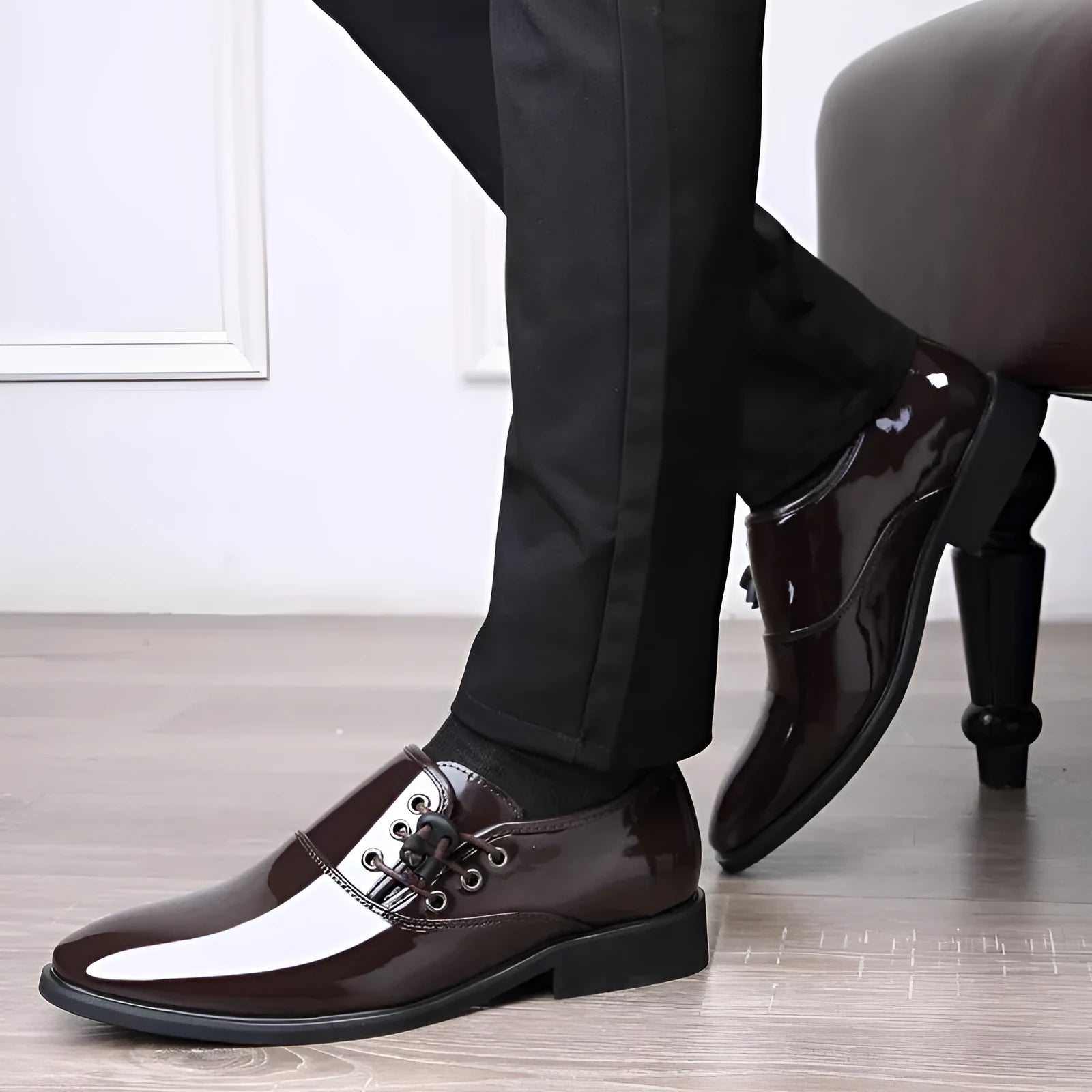 Men's black and brown formal business shoes with round toe and square heel, showing artificial PU upper and rubber sole.