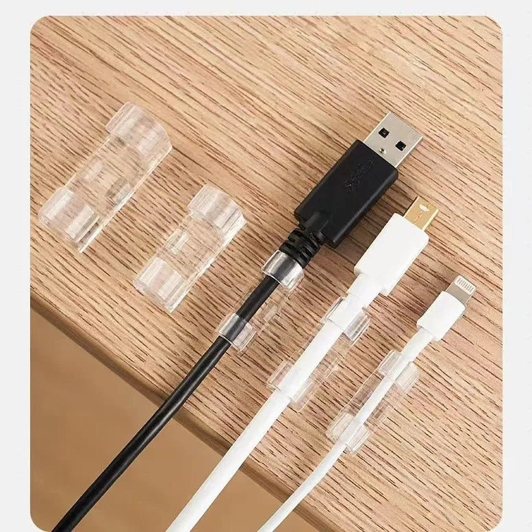 Transparent plastic self-adhesive cable clips for wire organisation in four size options